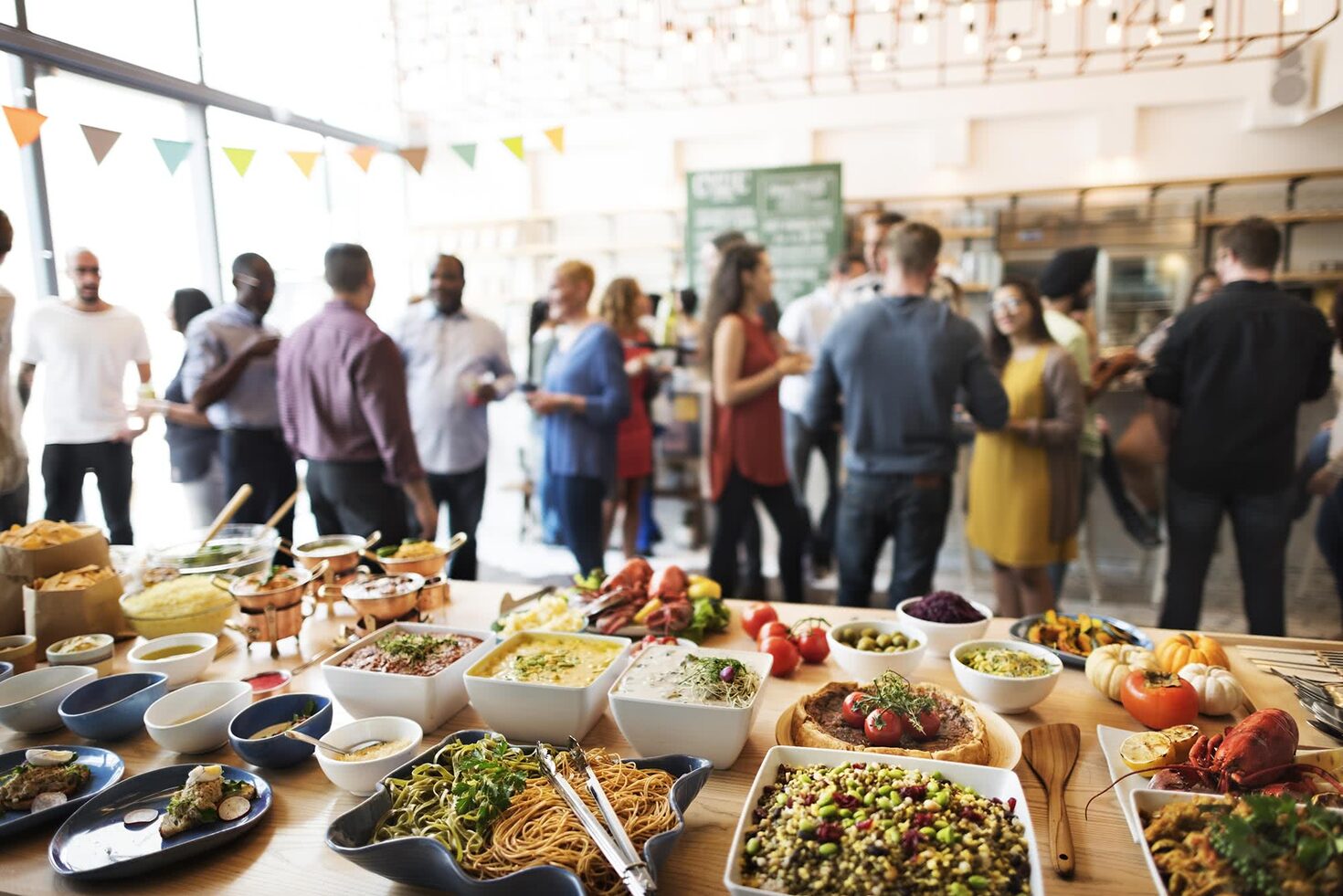 Colleagues at the buffet during a company event