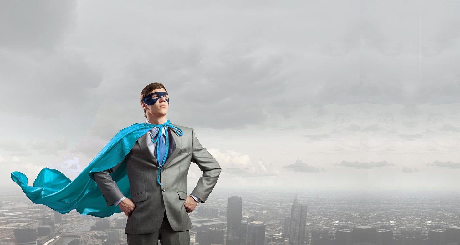 Businessman in a suit standing confidently